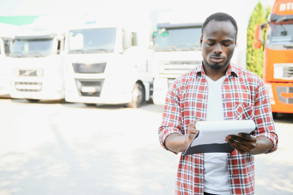 Young Man plaid shirt owner Truck Driver